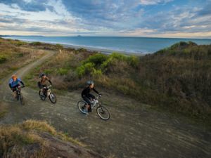 Tackling the Dunes Trail high above panoramic ocean views.
