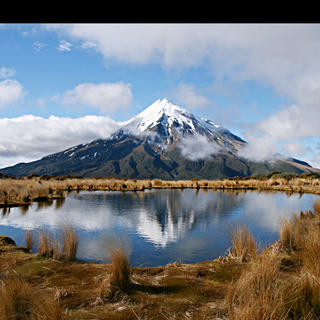 Get perfect views of Mount Taranaki during rewarding hike of the Pouakai Circuit in the northern region of Egmont National Park.
