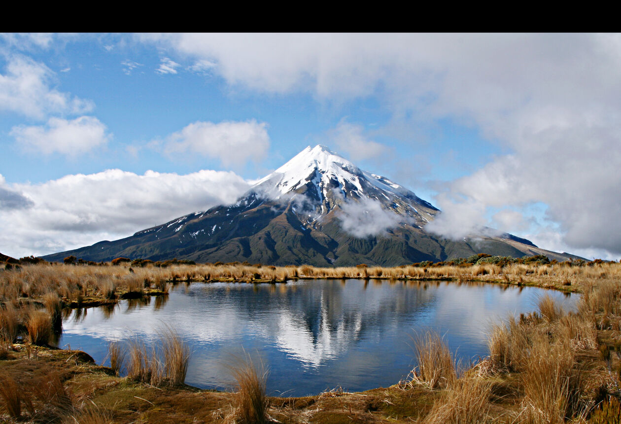 Taranaki is located on the western side of New Zealand's North Island and offers countless opportunities for adventure seekers. Hike under the shadow of Mount Taranaki or explore the green fertile lowlands and artistic culture of Taranaki, New Zealand.