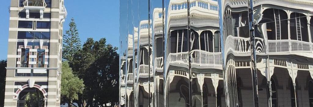 Reflections on the Govett-Brewster Art Gallery in New Plymouth.