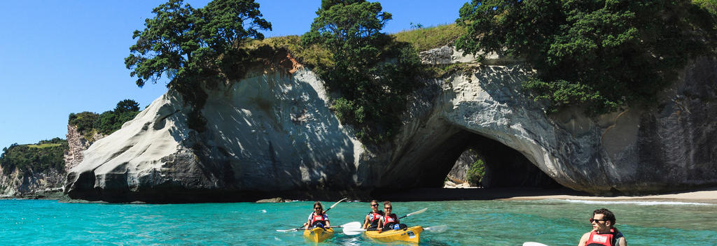 From Hahei (Coromandel Peninsula) take a guided sea kayak tour of the sensational local coastline. The tour includes a beach stop at Cathedral Cove, which is a top spot for a swim.