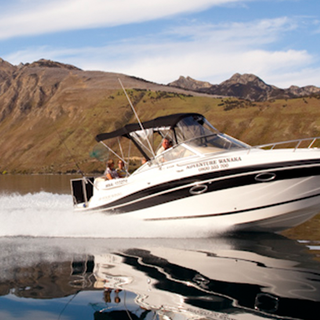 Enjoy a boat cruise on stunning Lake Wanaka, just an hour's drive from Queenstown