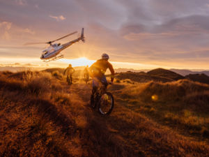 The ultimate Mount Burke mountain bike experience starts with a jaw-dropping helicopter ride high over Lake Wanaka and its surrounding mountains.