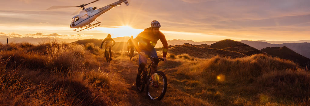 The ultimate Mount Burke mountain bike experience starts with a jaw-dropping helicopter ride high over Lake Wanaka and its surrounding mountains.