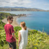 Couple walking on the Eastern Walkway, Breaker Bay, Wellington
