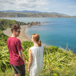 Couple walking on the Eastern Walkway, Breaker Bay, Wellington