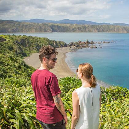 Couple walking on the Eastern Walkway, Breaker Bay, Wellington