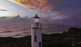 Aerial view of Cape Foulwind lighthouse at dawn