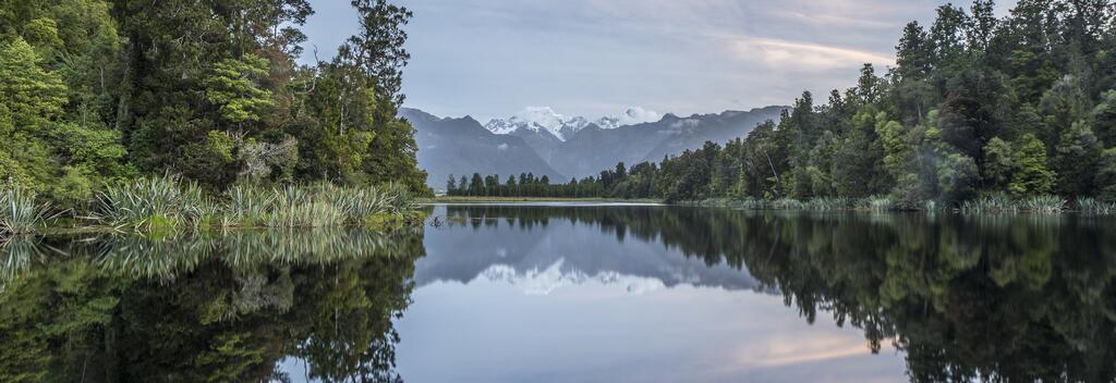 Views of Aoraki Mt Cook reflecting in Lake Matheson 