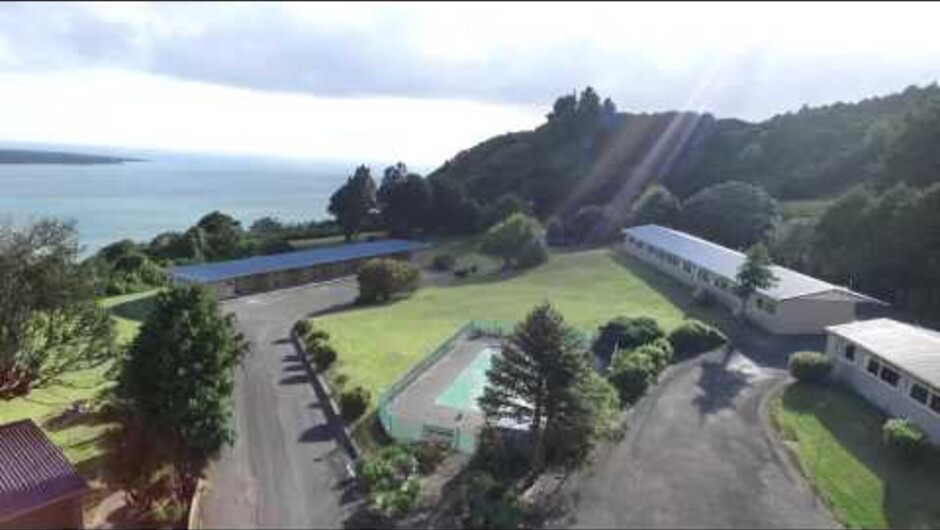 Drone visits Hicks Bay when Citreon Car Club pose for departure photos.