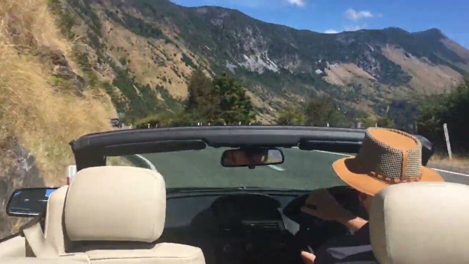 Driving one of New Zealand's more refined bending roads, Takaka Hill, in RentAClassics BMW 6 Series convertible.