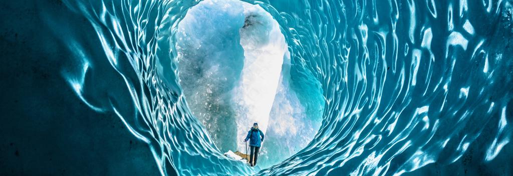 Person exploring Tasman Glacier Ice Cave 