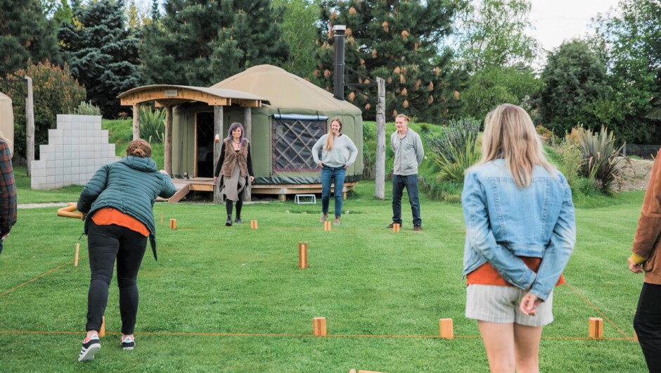 Friends enjoying an exclusive group booking and the onsite lawn games.
