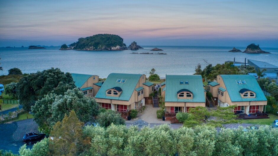 Relaxed Hahei beachfront living - choose your Coromandel accommodation from the serviced sea view villas, baches, cabins, powered or non-powered campsites in the award-winning holiday park gardens.