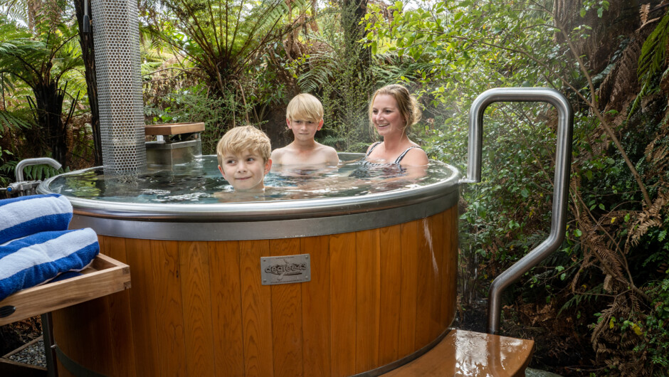 Exploring the glaciers? Stay & Soak in Franz Josef with the family.