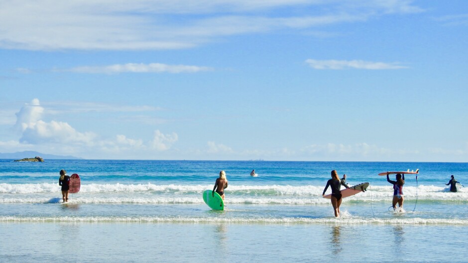 Ladies Learning to Surf In Mount Maunganui.