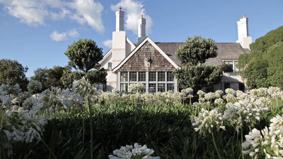 After your lunch, stroll the expansive gardens of Wharekauhau Country Estate.