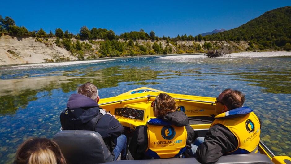 Crystal-clear waters of the Upper Waiau River and the stunning Fiordland National Park surrounds.