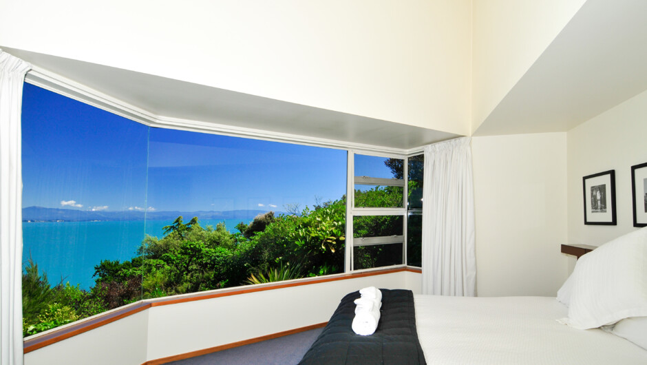 Master bedroom with King bed, sea views, Smart TV and ensuite bathroom