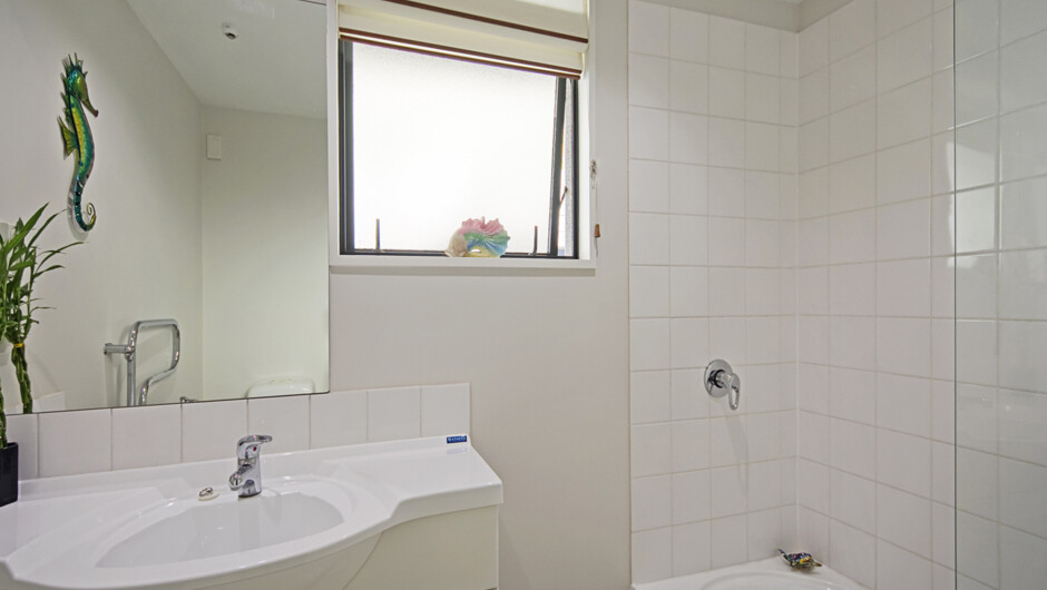 Main Bathroom with Shower over Bath, Toilet & Vanity