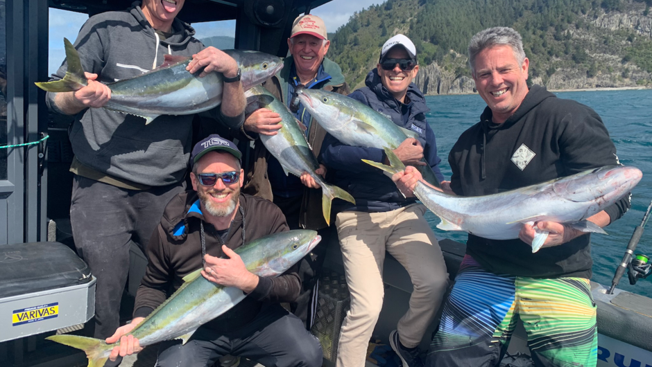 A successful family day catching kingfish for the table.