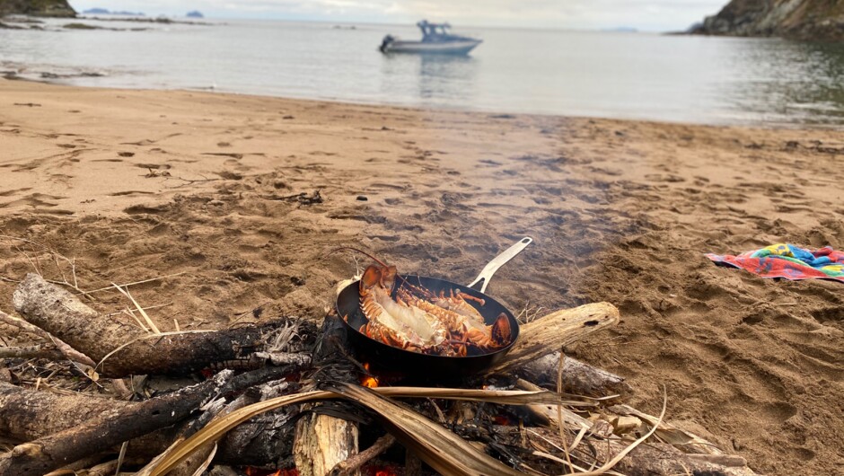 A break between fishing to enjoy fresh crayfish cooked on a deserted beach over a fire. Sometimes it is the simple things in life.