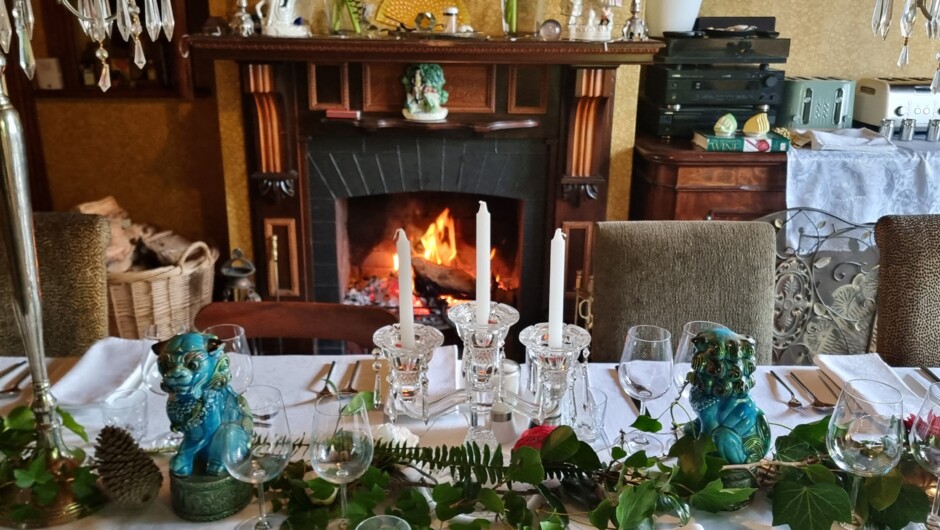 The breakfast room is all set up for a candlelit breakfast with a roaring fire. Full cooked options, whiskey butter porridge, toasts - including gluten free are complimentary with lashings of tea and coffee.