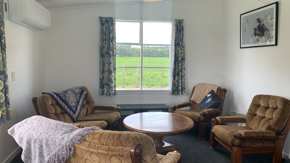 Great sized lounge and dining. There is also a table and 4 chairs in here, as well as a well equipped bookshelf with plenty to do and kids toys too.