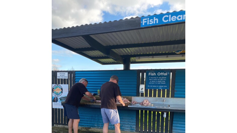 Fish filleting station and boat cleaning area