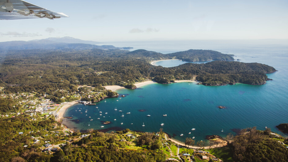 Glenorchy Air's Stewart Island Fly | Explore | Fly ex Queenstown overlooking Oban from the air.