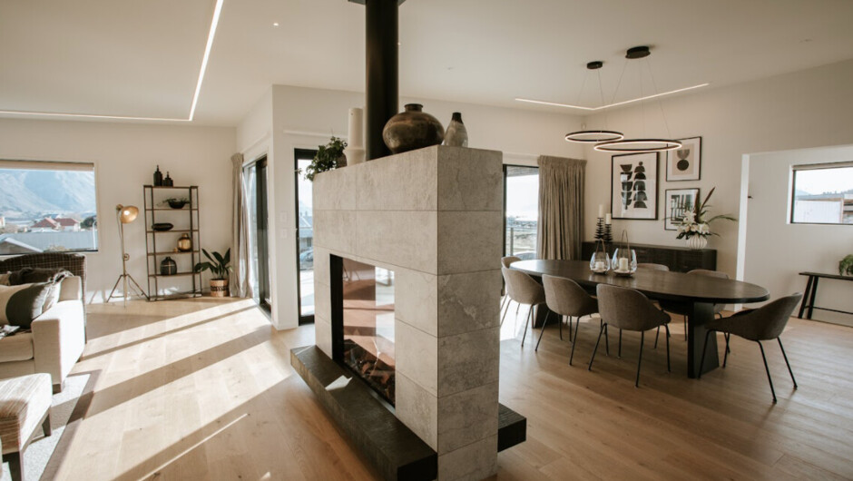 Double sided gas fire in the lounge dining area.