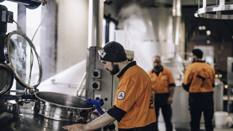 Mason looking in the Mash Tun