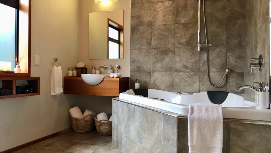 Villa bathroom with double hydrotherapy spa, italian tiles and underfloor heating.