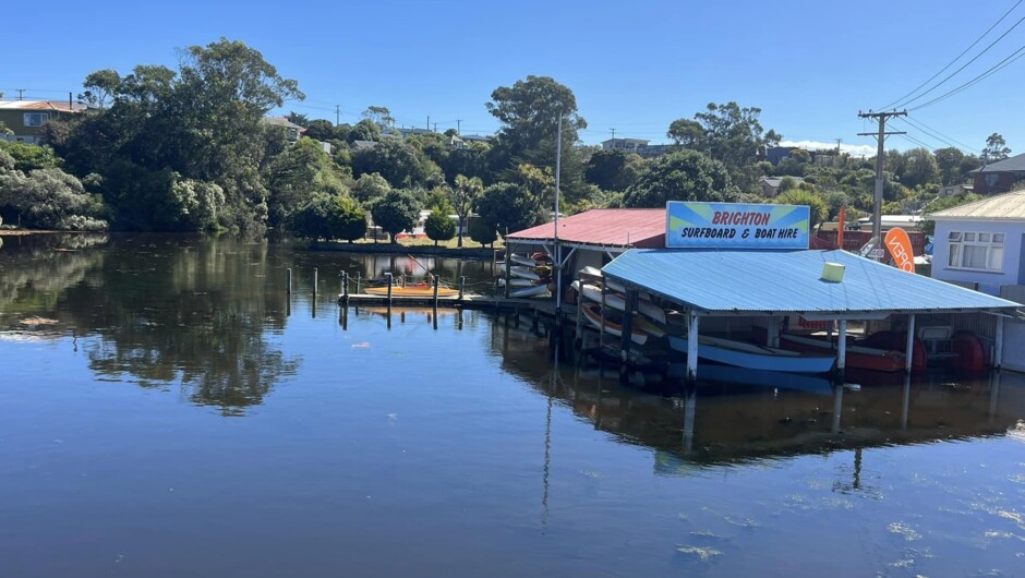 The Brighton Boat Shed and creek, photo taken from the road bridge that crosses the creek.
