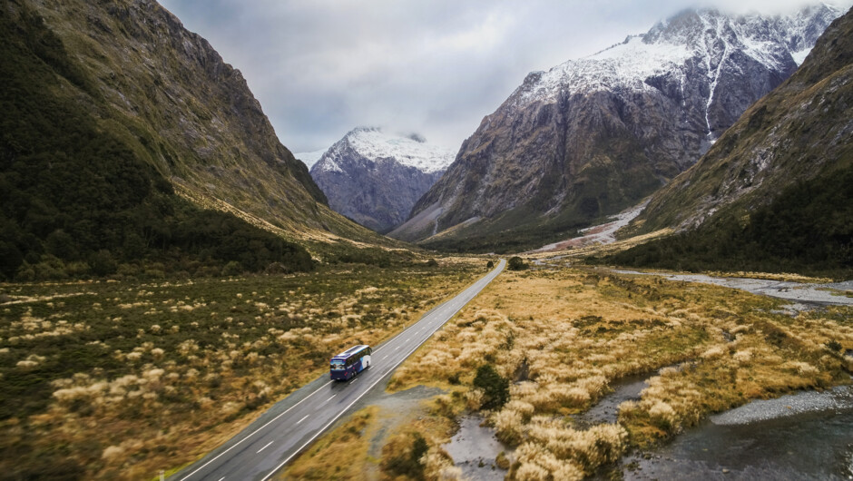 Enjoy the scenery on the road to Milford Sound on New Zealand's luxury coach tour