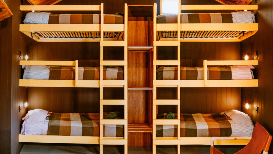 Triple Bunk Cabin: features plenty of floor area and 2 triple-stacker bunks with a total of 6 single beds. Perfect for groups. 6 people maximum.