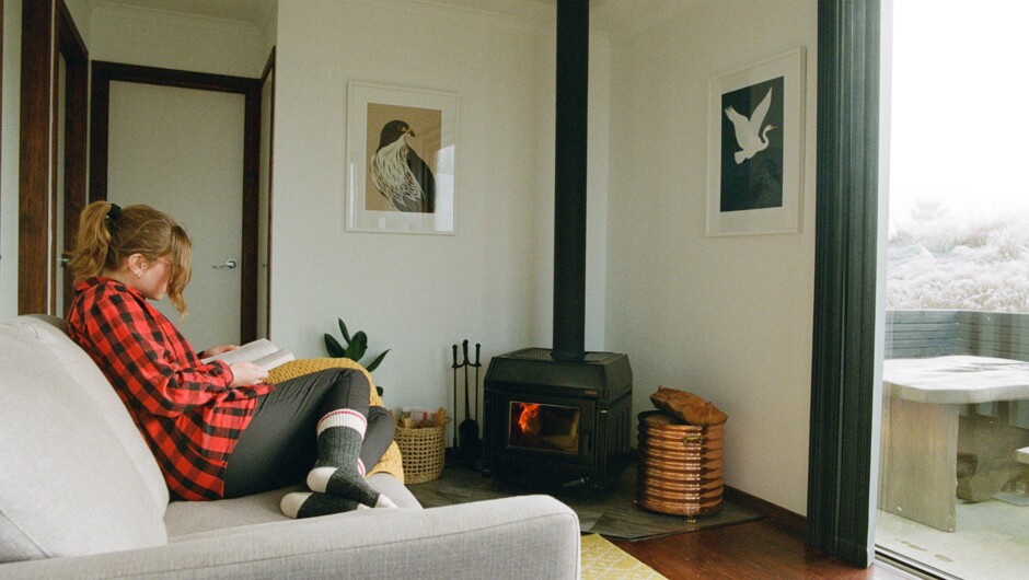 A logburner keeps you warm and cosy in cooler months. The bedroom and living room also have wall heaters.