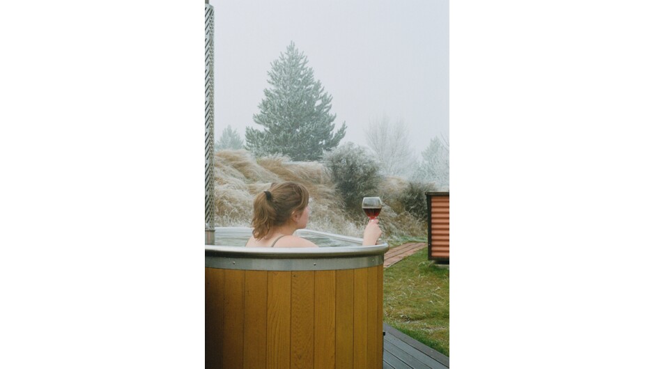 Warming up in the wood-fired hot tub on a winter's day.