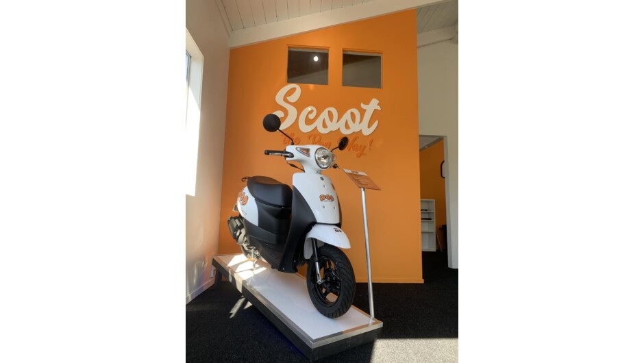 Inside the Pop Scooter Hire shop.