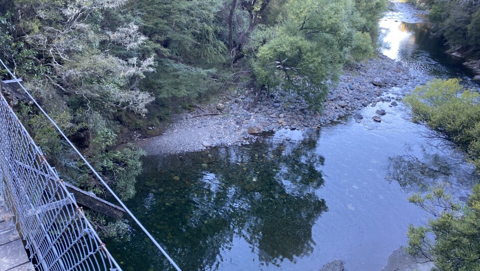 The Baton House is accessed via a short swing bridge over the Baton River.