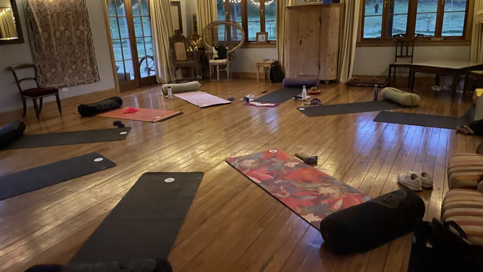 The ballroom provides a great space for yoga, dance, group gatherings and a large, open fire place in Winter.