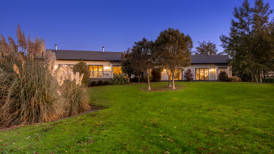 Lakeside Cottages at dusk -  Sleeps 2, One Bedroom, spa bath, kitchenette, Nespresso coffee machine, private deck, gas fireplace