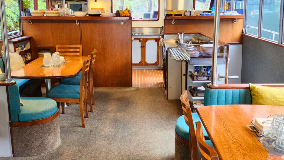 Relax in our welcoming dining lounge - space to share meals, stories, and Fiordland’s stillness.