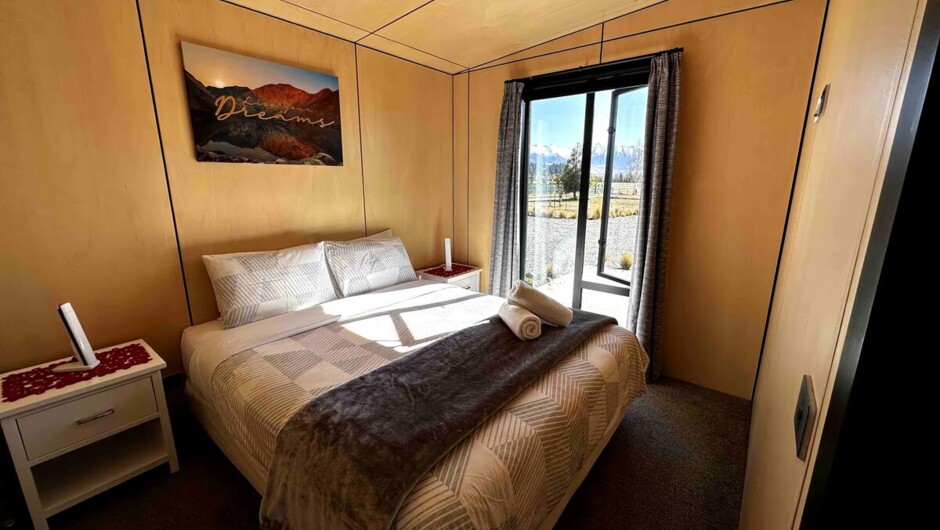 Bedroom 1. Mountain and garden views from the bedroom window