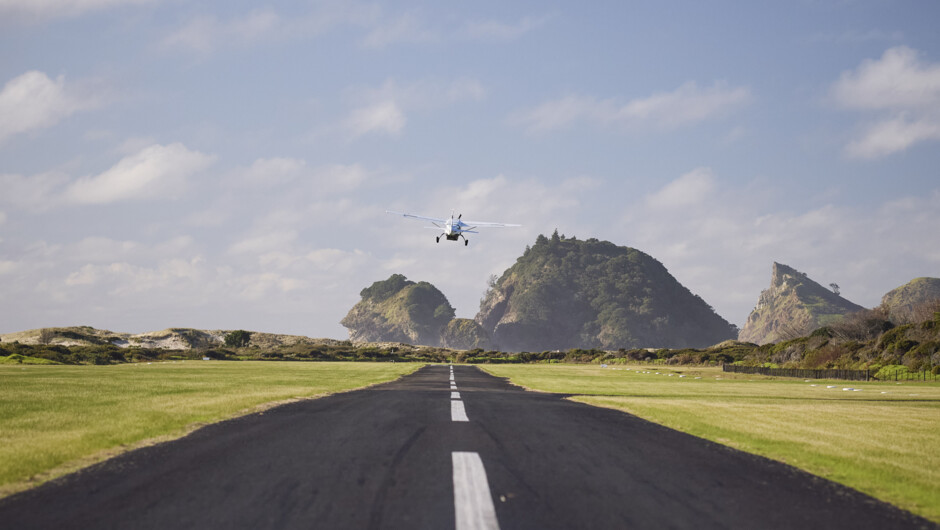 Barrier Air aircraft taking off from Great Barrier Island