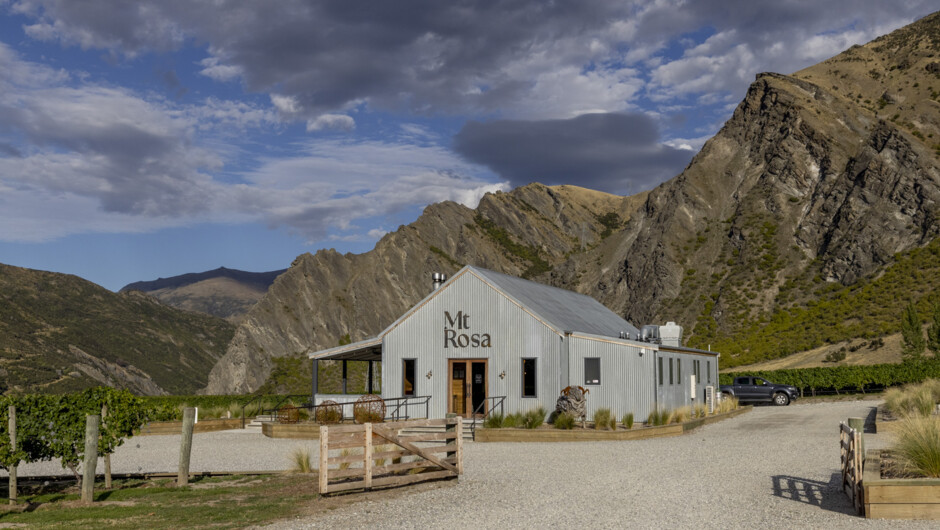 Mt Rosa Cellar Door sits beneath the Nevis Bluff on Gibbston Back Road.  The best setting and views in Gibbston to enjoy single vineyard wines.