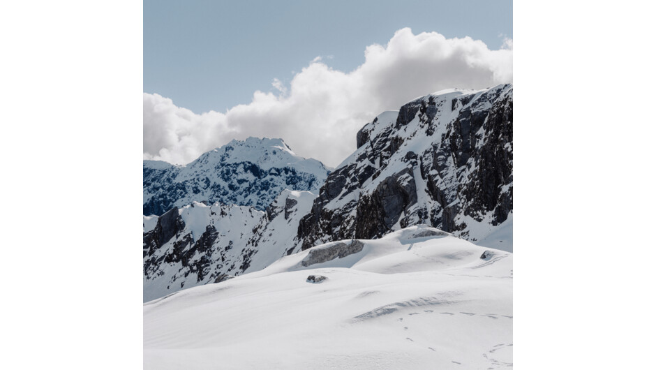 Land in the snow, even in summer