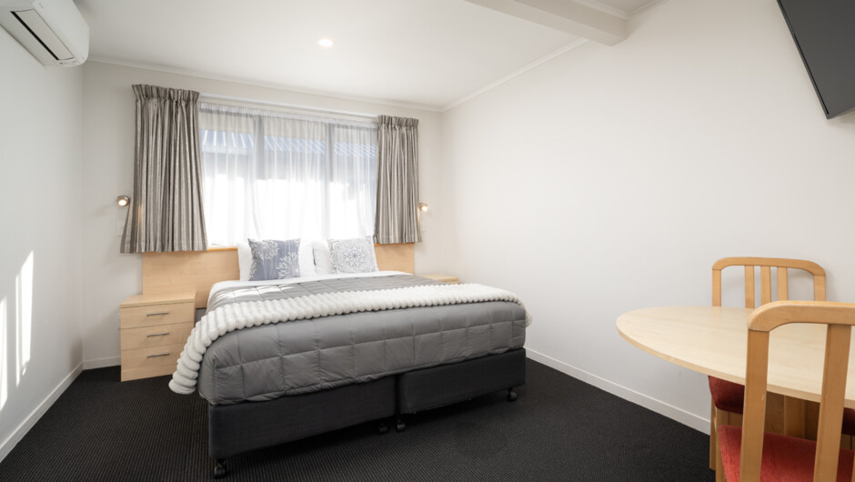Standard Studio Room - King Bed, Air Conditioning, Electric blankets, Ensuite Bathroom, Private Patio. Kitchenette with stovetop, fridge, microwave. Flat Screen TV with SKY channels.