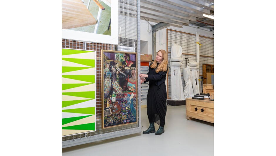Christchurch Art Gallery Te Puna o Waiwhetū | Lead Curator Felicity Milburn with Jacqueline Fahey's painting Mother and daughter quarrelling.
