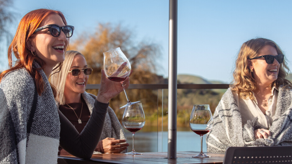 Sunny sips on the deck with lake views and good company.